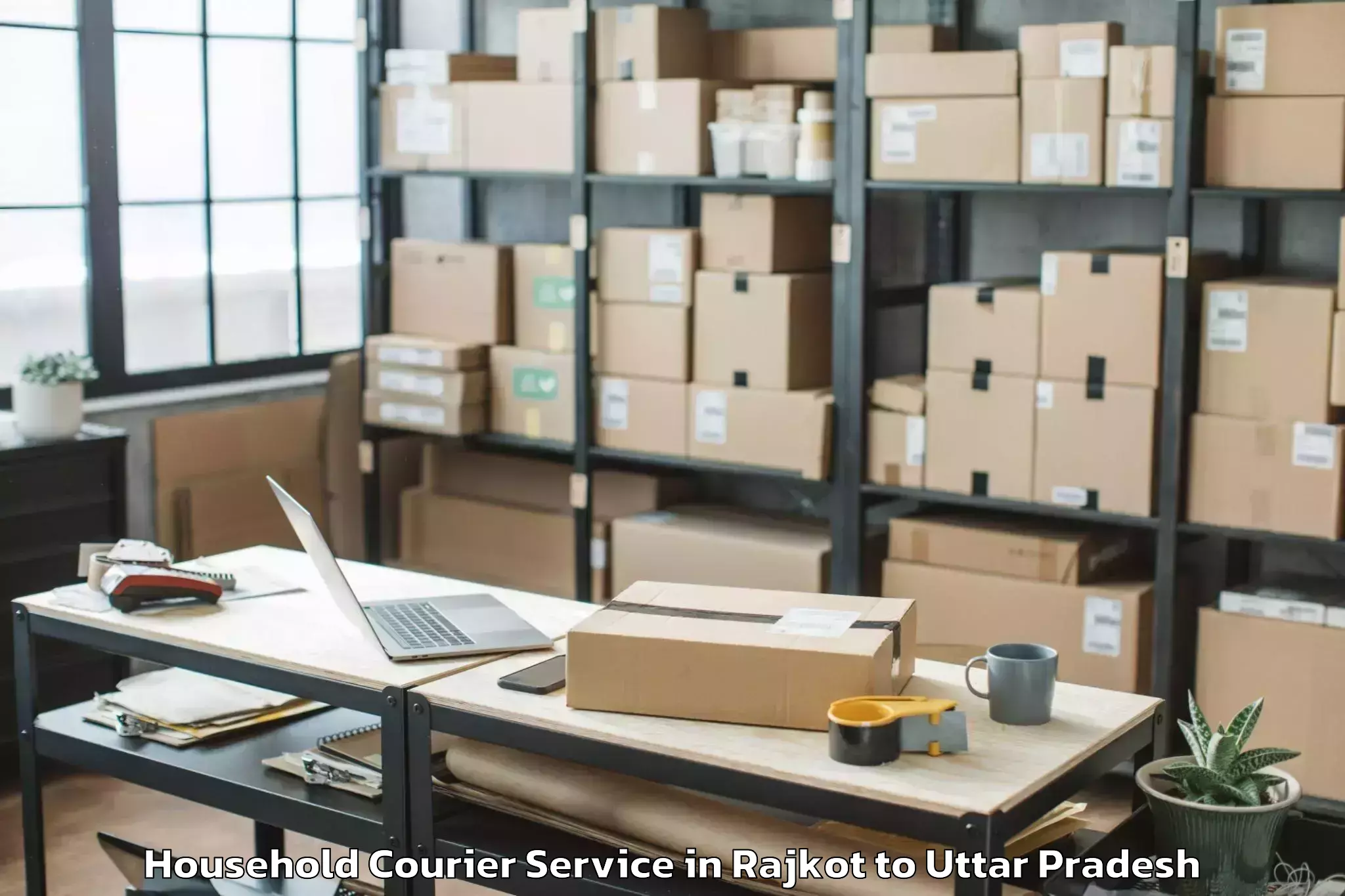 Reliable Rajkot to Manjhanpur Household Courier